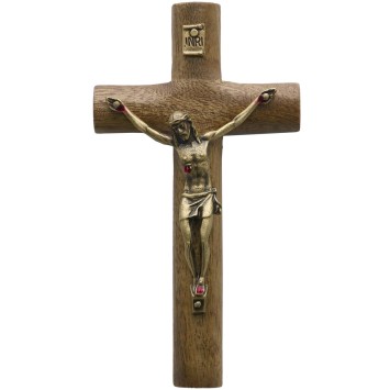 Crucifix cylindrique en bois à suspendre, avec Christ bronze portant les Saintes Plaies. H : 12 cm.