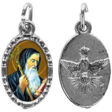 Médaille métal de couleur argentée ovale avec rebord effet dentelle H.1,5 cm avec résine. Disponible avec différents Saint