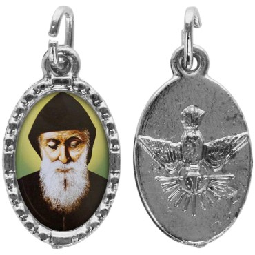 Médaille métal de couleur argentée ovale avec rebord effet dentelle H.1,5 cm avec résine. Disponible avec différents Saint