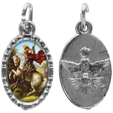 Médaille métal de couleur argentée ovale avec rebord effet dentelle H.1,5 cm avec résine. Disponible avec différents Saint