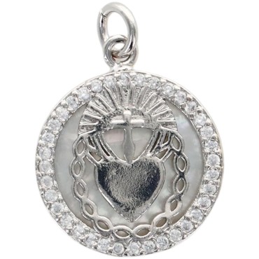 Médaille de l'EX-VOTO Ø 1.6 cm en laiton de couleur argenté, contour avec zircons et coquille naturelle.