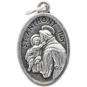 Médaille en métal couleur argentée forme ovale H. 2,2 cm. Plusieurs saints
