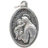 Médaille en métal couleur argentée forme ovale H. 2,2 cm. Plusieurs saints