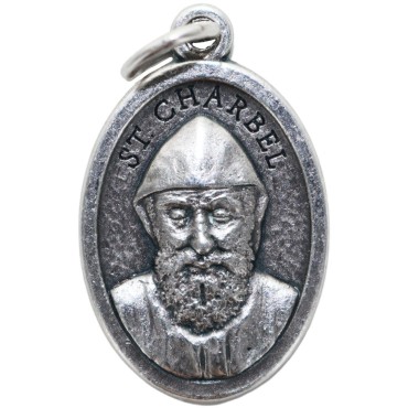 Médaille en métal couleur argentée forme ovale H. 2,2 cm. Plusieurs saints