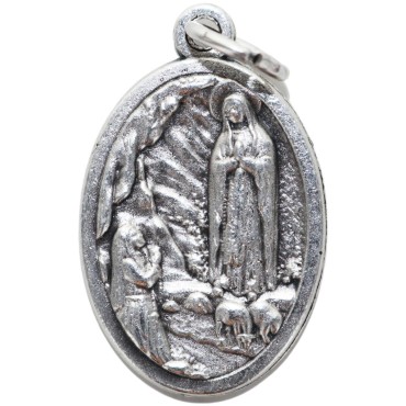 Médaille en métal couleur argentée forme ovale H. 2,2 cm. Plusieurs saints
