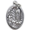 Médaille en métal couleur argentée forme ovale H. 2,2 cm. Plusieurs saints