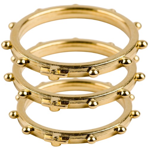 Dizainier bague métal couleur dorée avec petite croix relief.