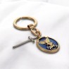 Porte-clés en métal doré, émail bleu, Saint Michel avec rayons et breloque épée – H. 3 cm.