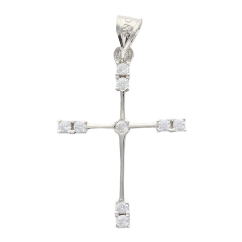 Croix de cou sertie de zirconium aux extremites en argent 925 °/°° rhodie. H 2.8 cm (0.70 g). Livree en boite.