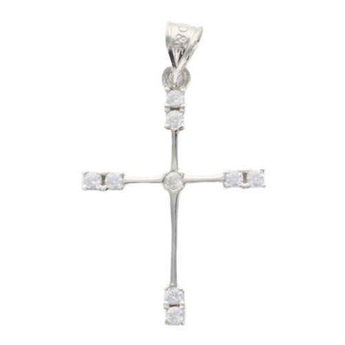 Croix de cou sertie de zirconium aux extremites en argent 925 °/°° rhodie. H 2.8 cm (0.70 g). Livree en boite.