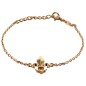 Bracelet avec fleur de lys 1.5 cm en plaqué or. Livrée en boîte.