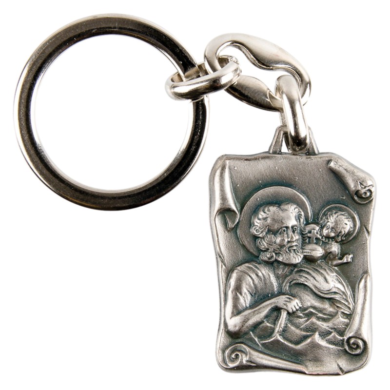 Porte-clés de saint Christophe H. 3,3 cm forme parchemin en métal couleur argentée.