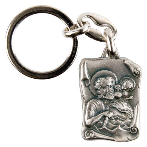Porte-clés de saint Christophe H. 3,3 cm forme parchemin en métal couleur argentée.