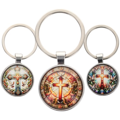Porte-cles en metal de couleur argentee et en verre, Ø 2,7 cm, avec une croix. Existe avec differents motifs.