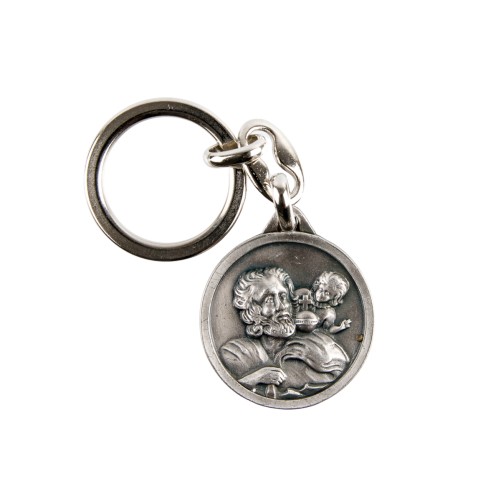 Porte-clés de saint Christophe en buste Ø 3 cm en métal couleur argentée.