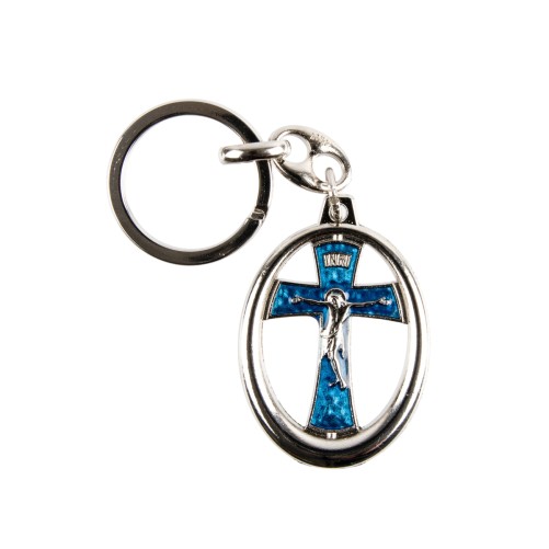 Porte-cles ovale H. 3,9 cm argente avec croix ajouree, emaillee bleue avec Christ.