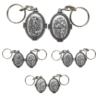 Porte-clés H. 4.5 cm en métal couleur argentée forme ovale double face, plusieurs saints.