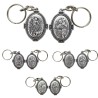 Porte-clés H. 4.5 cm en métal couleur argentée forme ovale double face, plusieurs saints.