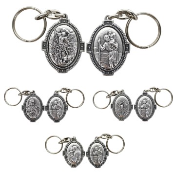 Porte-clés H. 4.5 cm en métal couleur argentée forme ovale double face, plusieurs saints.