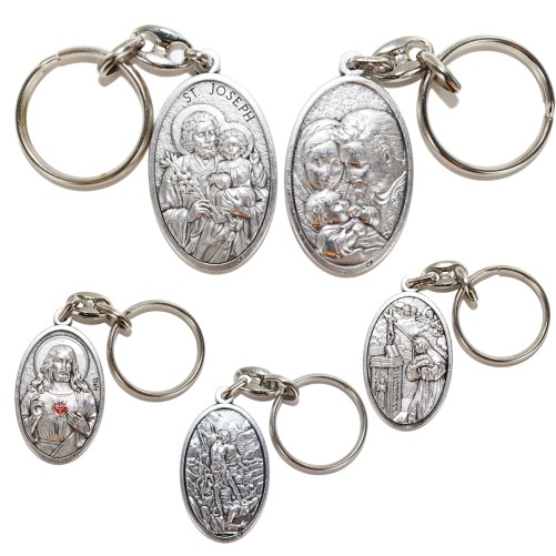 Porte-clés H. 4.5 cm en métal couleur argentée, plusieurs saints.