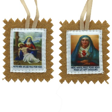Scapulaire en tissus des 7 douleurs avec explications H. 4,5 x 5 cm. Livre en sachet individuel.