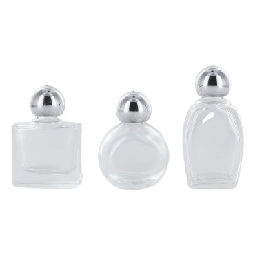 Bouteilles en verre de differentes formes H. 4,5 cm livrees en assortiment.