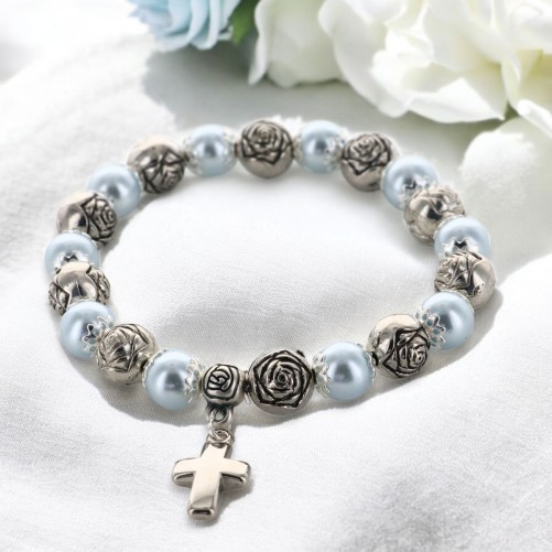 Bracelet sur elastique avec grains en metal forme rose et de grains metal Ø 8 mm avec une croix. Differentes couleurs