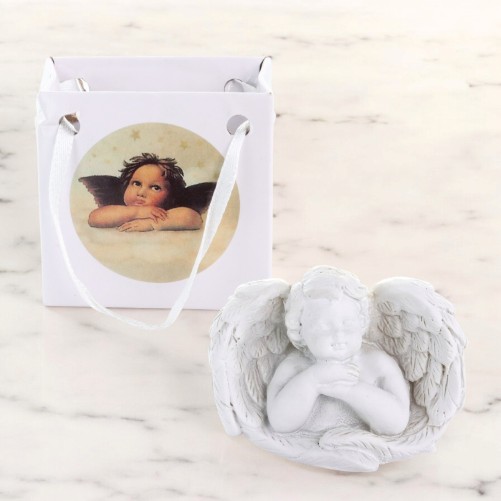 Ange gardien dans aile, hauteur 4.4 cm livre dans une pochette cadeau. Boite presentoir de 24 anges assortis.