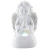 Ange assis en pière avec un coeur lumière tournante- Hauteur 9 cm