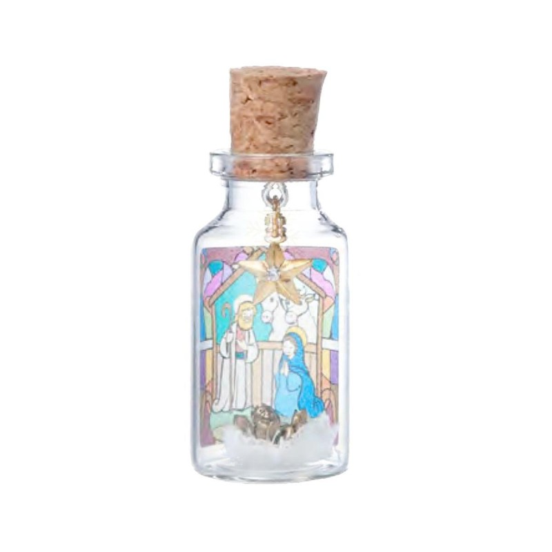 Bouteille en verre décor Nativité, étoile à strass suspendue et Jésus en métal antique. 2,6 x 6 cm.