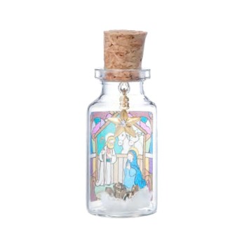 Bouteille en verre décor Nativité, étoile à strass suspendue et Jésus en métal antique. 2,6 x 6 cm.