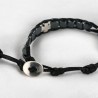 Bracelet dizainier ajustable sur corde de couleur noire avec grains carres en hématite et croix en métal.