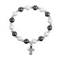 Bracelet sur elastique en hematite avec grains nacres Ø 8 mm, avec croix.