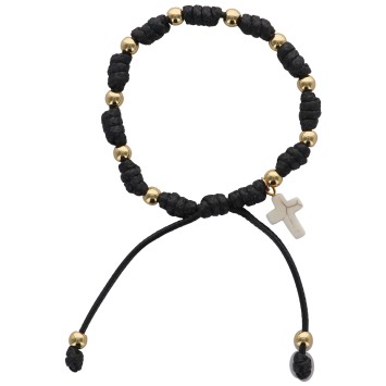 Bracelet dizainier sur corde reglable, grains de couleurs dores Ø 5 mm et croix. Existe en differentes couleurs.