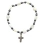 Bracelet dizainier sur élastique grains nacrés forme cœur et hématite avec croix métal.