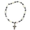 Bracelet dizainier sur élastique grains nacrés forme cœur et hématite avec croix métal.