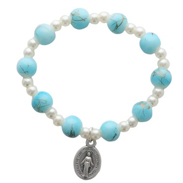 Bracelet dizainier sur elastique pour enfant grains en plastique marbre de differentes couleurs.