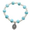 Bracelet dizainier sur elastique pour enfant grains en plastique marbre de differentes couleurs.