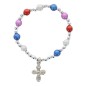 Bracelet dizainier sur elastique pour enfant avec grains saturne multicolore Ø 6 mm avec croix metal ou medaille