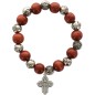 Bracelet dizainier sur elastique grains bois et grains forme rose Ø 1 cm avec croix metal.