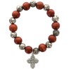 Bracelet dizainier sur elastique grains bois et grains forme rose Ø 1 cm avec croix metal.