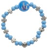 Bracelet sur elastique pour enfant de couleur bleu ou rose, grains en bois et croix  Ø 4 mm et resine de la V. Miraculeuse