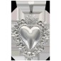 Pendentif de L'Ex-Voto en acier inoxydable de couleur argenté, H. 3.7 cm.