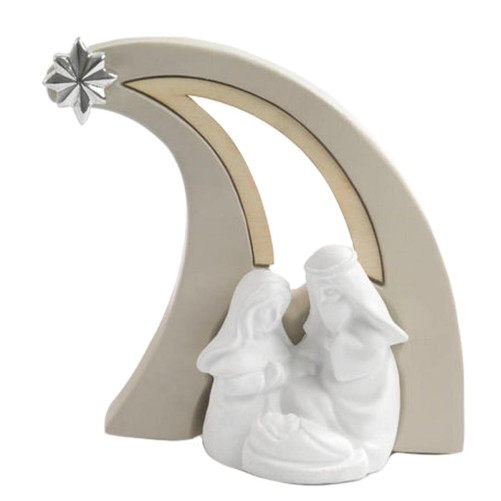 Nativité en forme d'étoile filante de couleur blanche et beige, H. 10.5 cm.