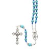 Chapelet avec grains en turquoise synthétique Ø 6 mm, croix en métal avec Christ. Longueur jusqu'au cœur 30 cm.