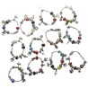 Bracelet en métal de couleur argentée avec breloques et perle de verre. LOT DE 4 ASSORTIS